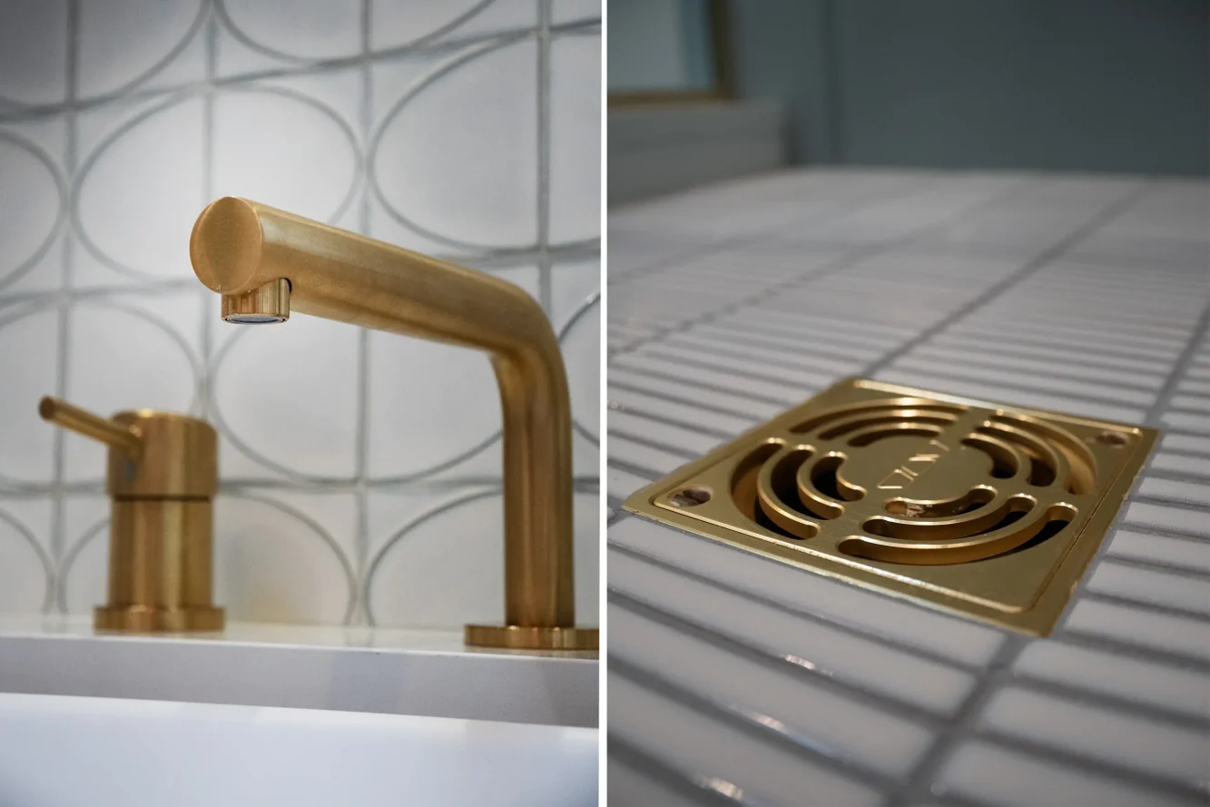 Closeup view of bath details - faucet and drain. 